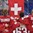 PLYMOUTH, MICHIGAN - APRIL 6: Players from team Switzerland look on during the playing of their national anthem after a 3-2 overtime win against team Czech Republic during relegation round action at the 2017 IIHF Ice Hockey Women's World Championship. (Photo by Minas Panagiotakis/HHOF-IIHF Images)

